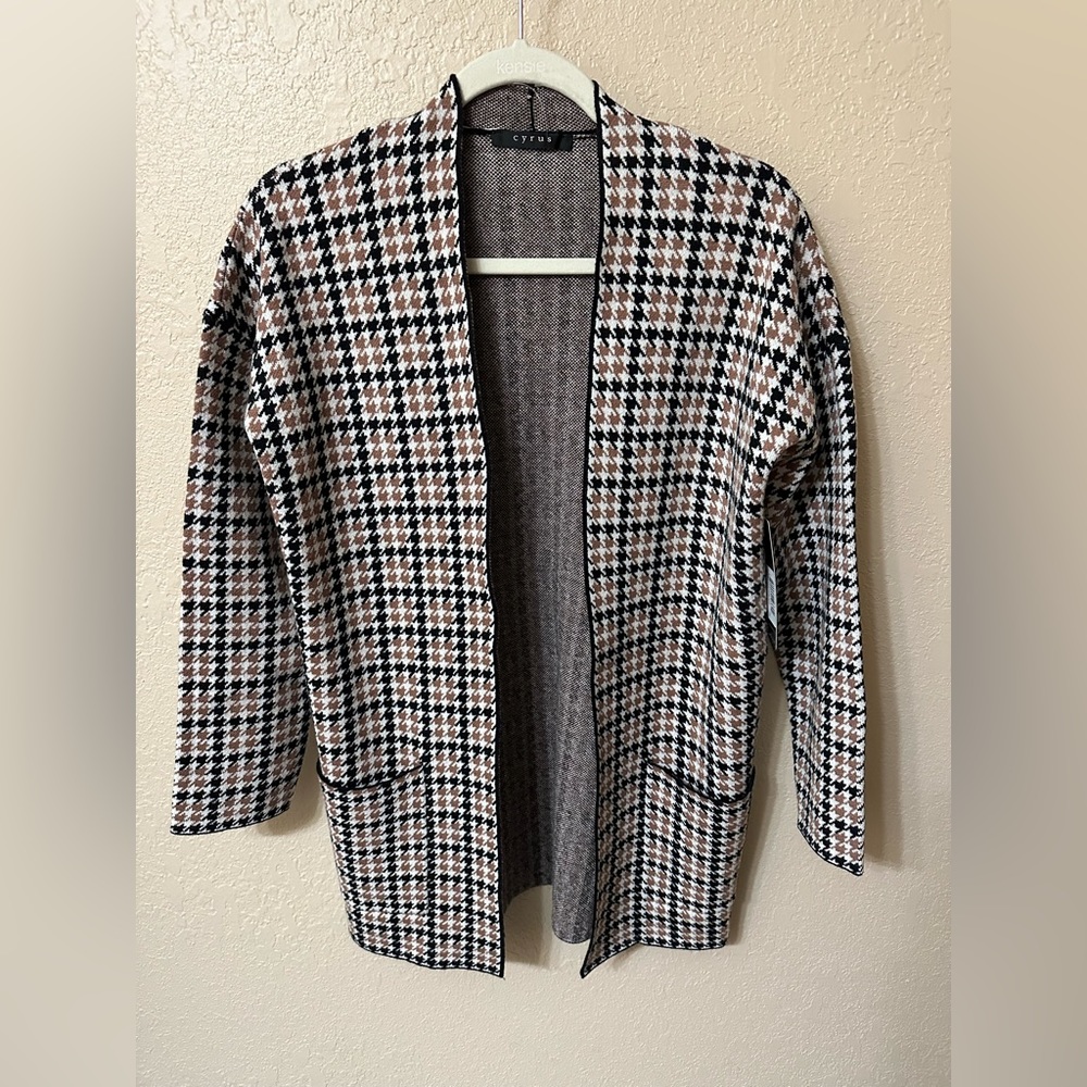Cyrus houndstooth sweater. Brand new.